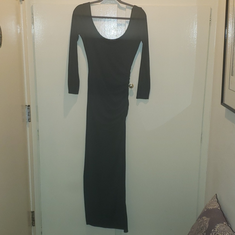 Curve-hugging black maxi dress